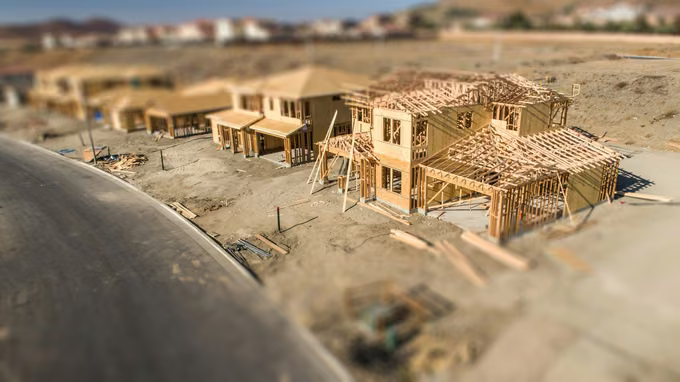 Framing - wood-frame houses under construction in a new subdivision